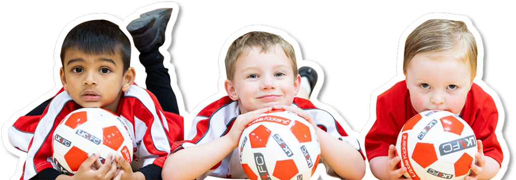 Children holding soccer balls